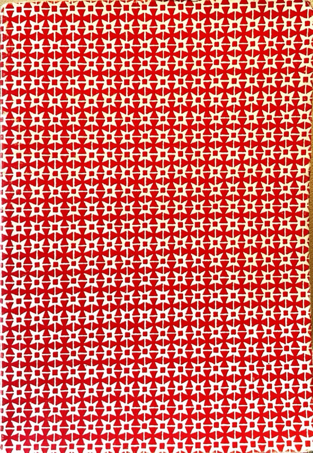 the closed sketchbook, red patterned cover